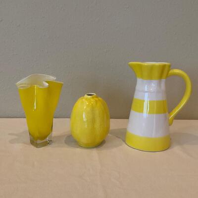 Small glass vase, glass lemon, and pitcher