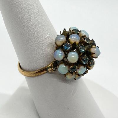 LOT 80: 10k gold Opal & Blue Topaz Size 7 Cluster Ring 4.2 grams total weight - missing one opal