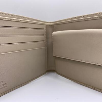 Vintage Brand New Gucci GG Canvas Tan And Brown Leather Bifold Wallet Serial No. 124547-4276 