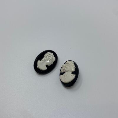 Two Black Carved Cameo Pins/Brooches