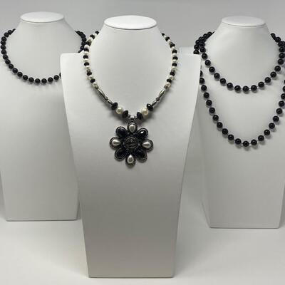 The Black and White Necklace Lot