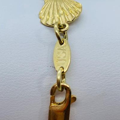 LOT 57: Tri-Color 14K Gold 7.5" "Shell" Bracelet - 9.32 gtw