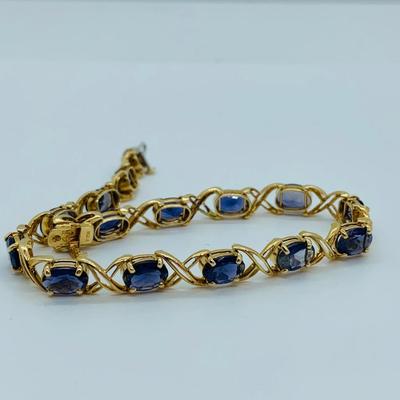 LOT 58: Tanzanite Gemstone 14K Gold Tennis Bracelet - 7.5" 9.9 gtw