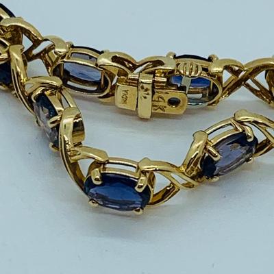 LOT 58: Tanzanite Gemstone 14K Gold Tennis Bracelet - 7.5" 9.9 gtw