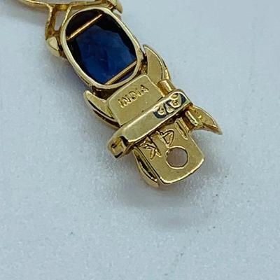 LOT 58: Tanzanite Gemstone 14K Gold Tennis Bracelet - 7.5" 9.9 gtw
