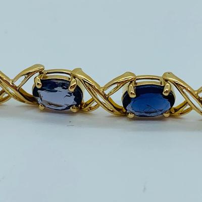 LOT 58: Tanzanite Gemstone 14K Gold Tennis Bracelet - 7.5" 9.9 gtw