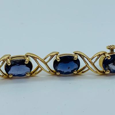 LOT 58: Tanzanite Gemstone 14K Gold Tennis Bracelet - 7.5" 9.9 gtw