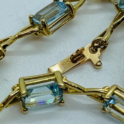 LOT 59: Blue Gemstone Emerald Cut 14K Gold 7.5" Tennis Bracelet - 6.93 gtw