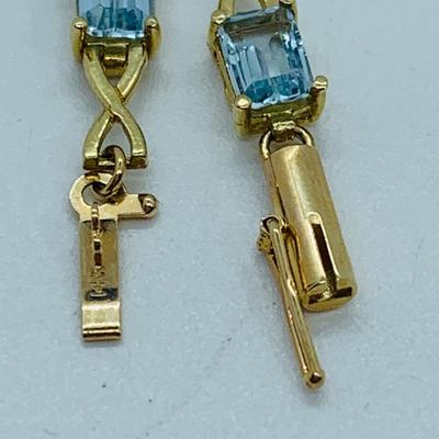 LOT 59: Blue Gemstone Emerald Cut 14K Gold 7.5" Tennis Bracelet - 6.93 gtw