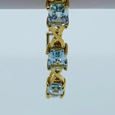 LOT 59: Blue Gemstone Emerald Cut 14K Gold 7.5" Tennis Bracelet - 6.93 gtw