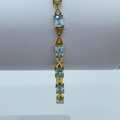 LOT 59: Blue Gemstone Emerald Cut 14K Gold 7.5" Tennis Bracelet - 6.93 gtw
