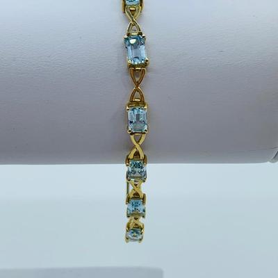 LOT 59: Blue Gemstone Emerald Cut 14K Gold 7.5" Tennis Bracelet - 6.93 gtw