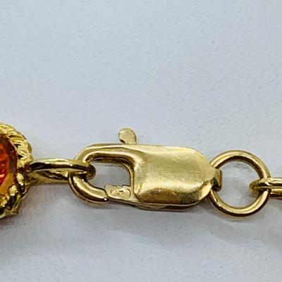 LOT 60: Padparadscha Sapphire 14K Gold 7.5" Tennis Bracelet - 6.2 gtw (One Stone Different than the Rest)