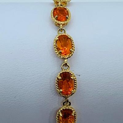 LOT 60: Padparadscha Sapphire 14K Gold 7.5" Tennis Bracelet - 6.2 gtw (One Stone Different than the Rest)