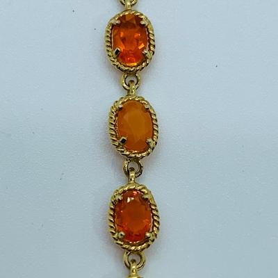 LOT 60: Padparadscha Sapphire 14K Gold 7.5" Tennis Bracelet - 6.2 gtw (One Stone Different than the Rest)