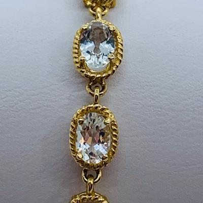 LOT 61: Light Aquamarine 14K Gold 7.5" Tennis Bracelet  - 7.01 gtw