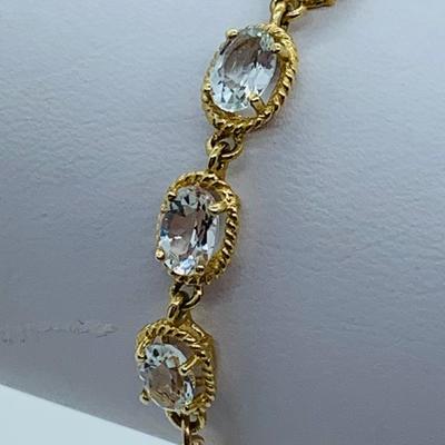 LOT 61: Light Aquamarine 14K Gold 7.5" Tennis Bracelet  - 7.01 gtw
