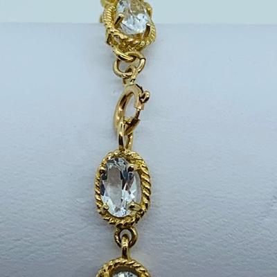 LOT 61: Light Aquamarine 14K Gold 7.5" Tennis Bracelet  - 7.01 gtw