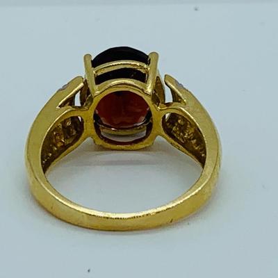 LOT 82: 14K Gold Garnet & Diamond Chip Size 7 Ring - 5 gtw
