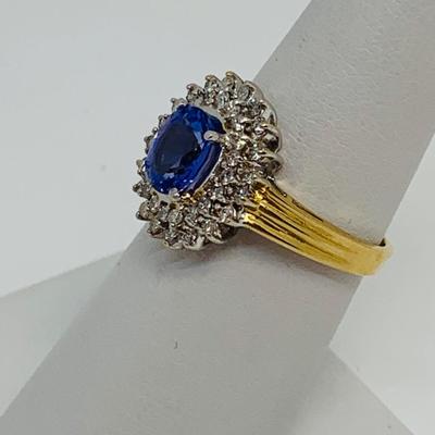 LOT 98: Nissko 14K Gold Tanzanite w/ Diamond Halo Ring - Size 7 - 3.44 gtw
