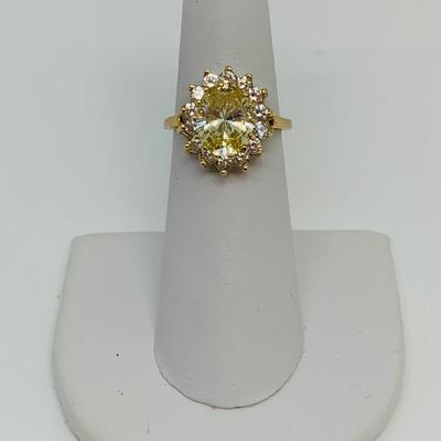 LOT 109: 14K Gold  Lemon Citrine with CZ halo  Size 6 Ring - 5 gtw