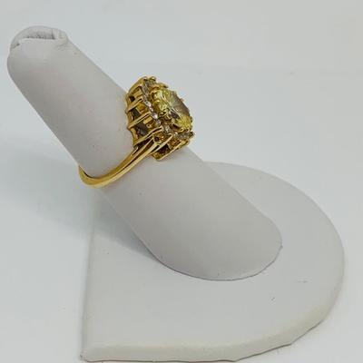 LOT 109: 14K Gold  Lemon Citrine with CZ halo  Size 6 Ring - 5 gtw