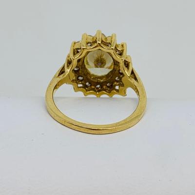 LOT 109: 14K Gold  Lemon Citrine with CZ halo  Size 6 Ring - 5 gtw