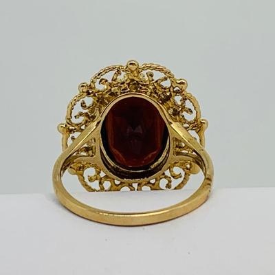 LOT 110: Garnet 10K Gold Size 8 Ring - 5.55 gtw