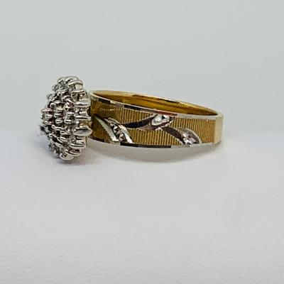 LOT 115: - 4.23g tw 10K EV 21 Diamond Cluster Ring -  two tone band - Size 7