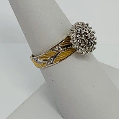 LOT 115: - 4.23g tw 10K EV 21 Diamond Cluster Ring -  two tone band - Size 7