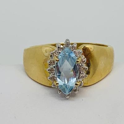 LOT 118: Blue Marquis Cut Topaz 14K Gold Ring - Size 7.5 - 3.58 gtw
