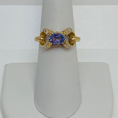 LOT 124: Tanzanite and Diamonds 14K Gold Ring - Size 7.5 - 3.94 gtw