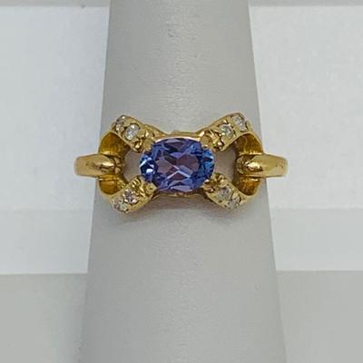 LOT 124: Tanzanite and Diamonds 14K Gold Ring - Size 7.5 - 3.94 gtw