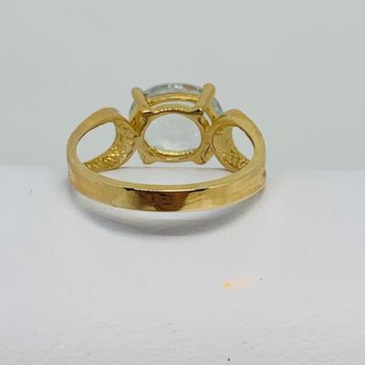 LOT 127: Blue Topaz 14K Gold Size 7 Ring - 3.4 gtw