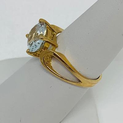 LOT 127: Blue Topaz 14K Gold Size 7 Ring - 3.4 gtw