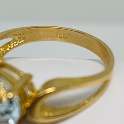 LOT 127: Blue Topaz 14K Gold Size 7 Ring - 3.4 gtw