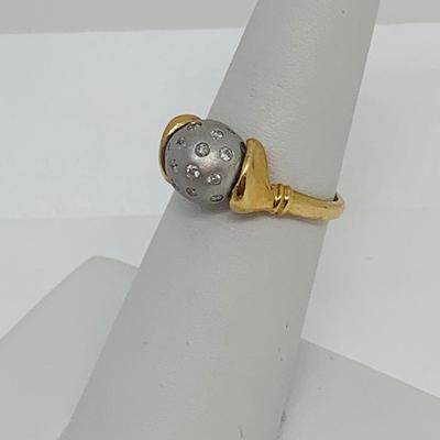 LOT  133: 18K Gold Grey Rolling Ball with Diamonds Ring - Size 6 - 4.62 gtw