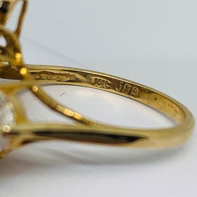 LOT 134: 10K Gold Ring - Tanzanite & CZ - Size 7 - 3.93 gtw