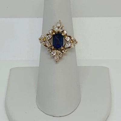 LOT 134: 10K Gold Ring - Tanzanite & CZ - Size 7 - 3.93 gtw