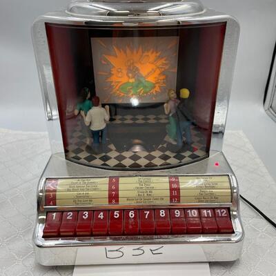 Jukebox-plugged in and plays music