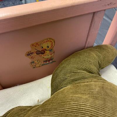 Adorable vintage baby bed and guests