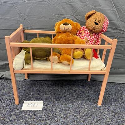 Adorable vintage baby bed and guests