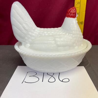 Westmoreland white hen on a nest