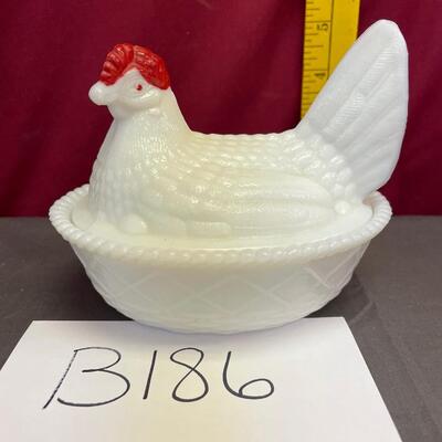 Westmoreland white hen on a nest