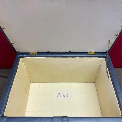 Blue footstool with storage inside