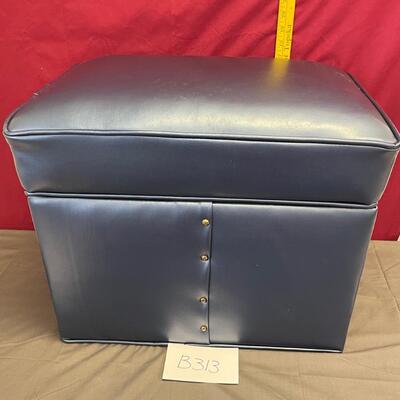 Blue footstool with storage inside
