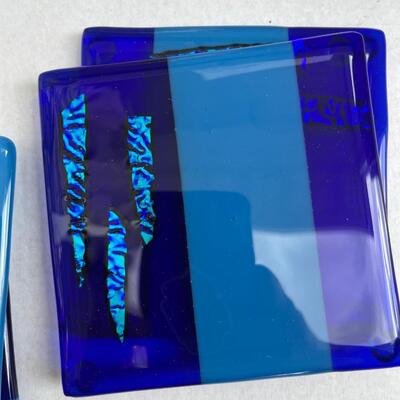 Glass trivet with artist signature