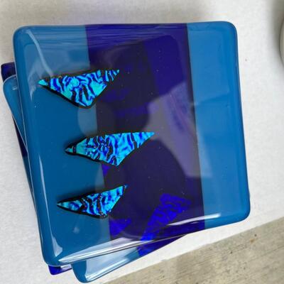 Glass trivet with artist signature