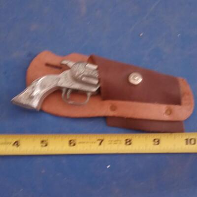 LOT 73  OLD TOY CAP GUN WITH LEATHER HOLSTER