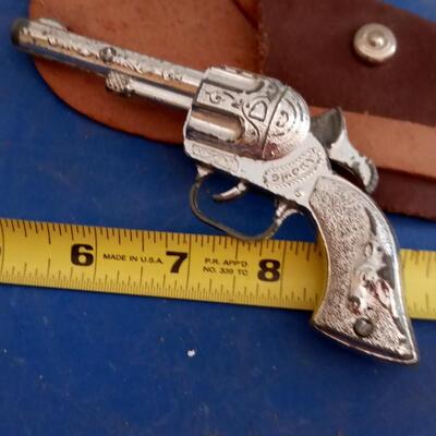 LOT 73  OLD TOY CAP GUN WITH LEATHER HOLSTER